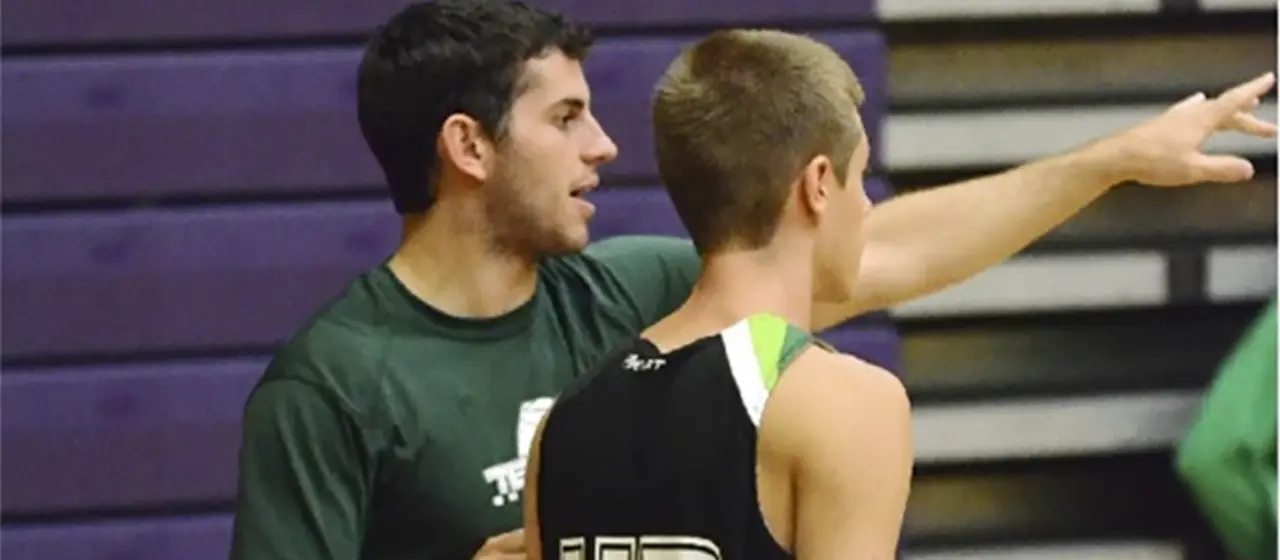 Coach mentoring basketball players