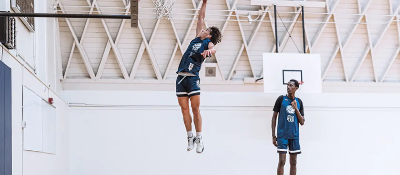 Basketball student-athletes work on increasing their vertical