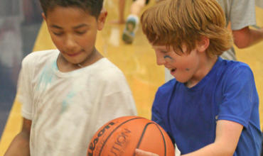 Younger basketball players passing drill fun