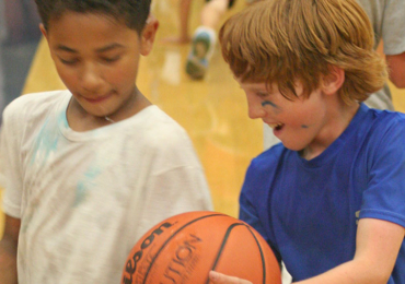 Younger basketball players passing drill fun