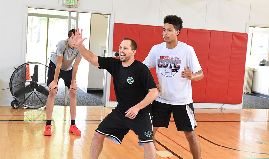 Coach teaching basketball post moves nbc camps