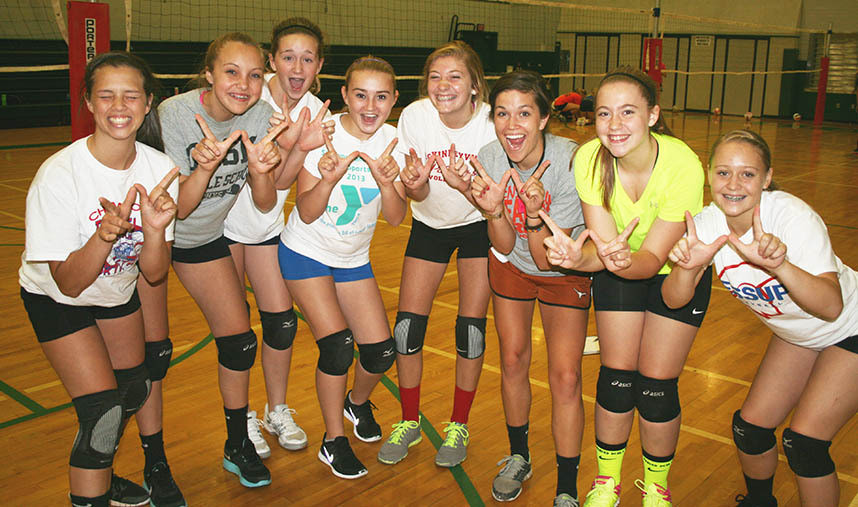 Volleyball team celebrates the win