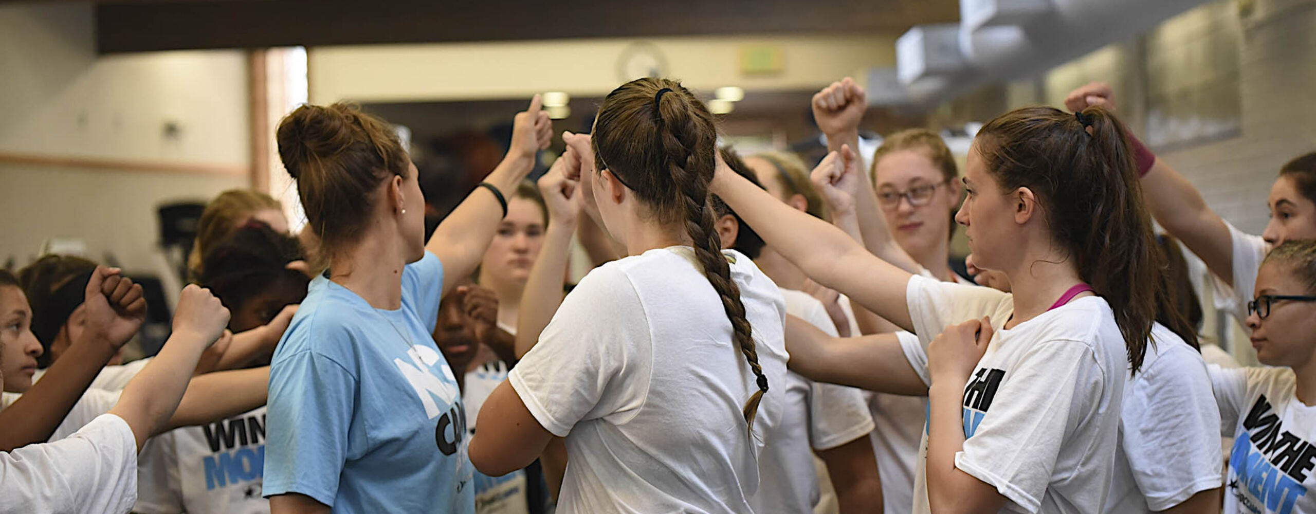 Campers huddle together for all-in commitment