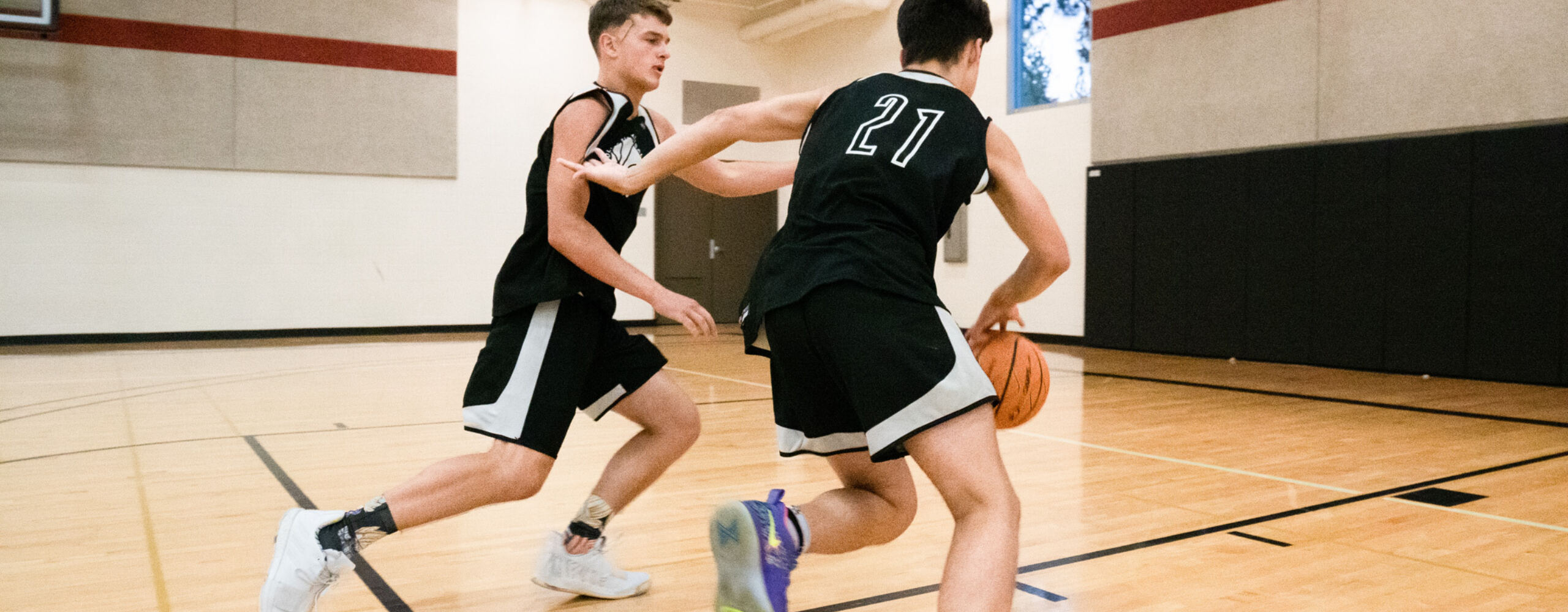 Basketball Campers offensive skill work attacking the basket in one on one drill