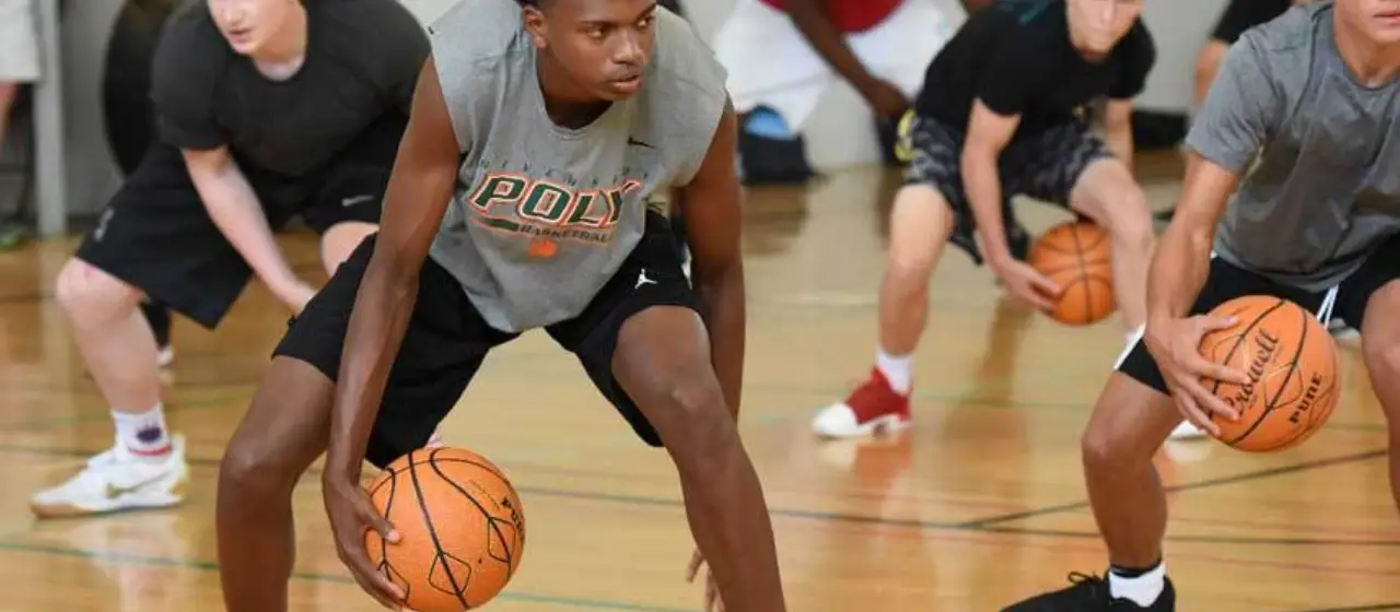 College prospective athletes work hard at their ball handling.