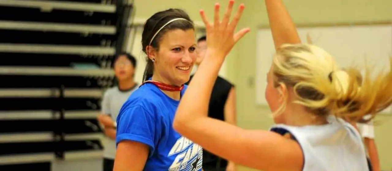 Coaches in a shooting drill have fun in-between teaching