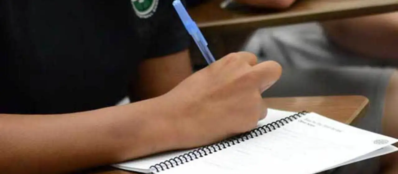 Camper fills out goal sheets and camp workbook