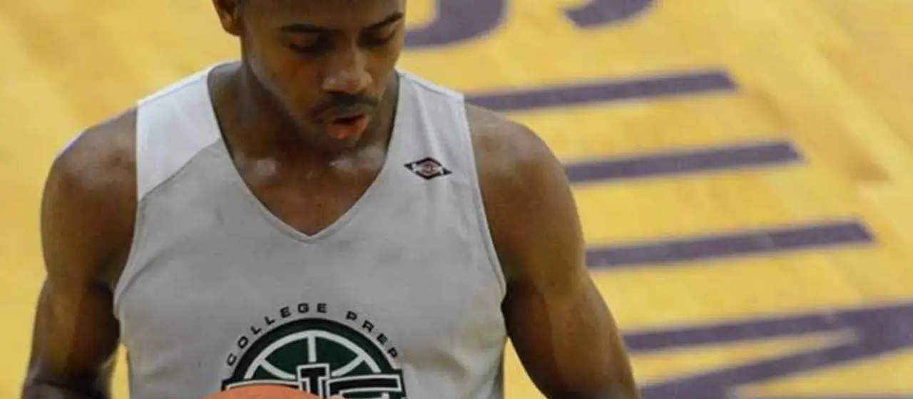Athlete contemplates before shooting free throw at NBC Basketball Camps