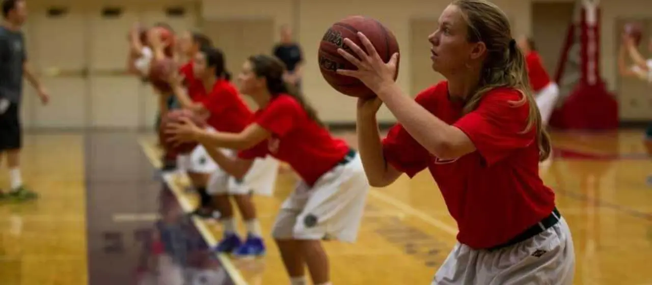 Girls practice visualization and shooting mechanics at NBC Basketball Pure Shooting Camp.