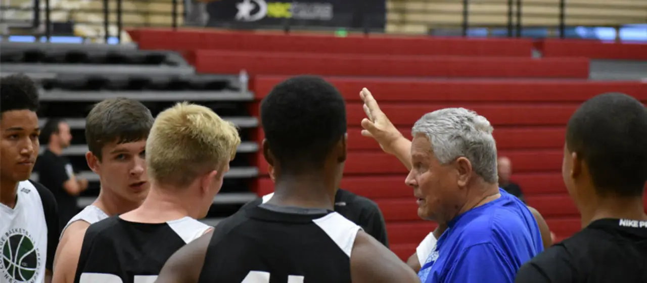 Founder Fred Crowell coaches at college basketball prep camp.