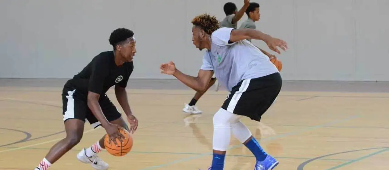 Campers attack the basket in training drills at NBC Basketball Camps