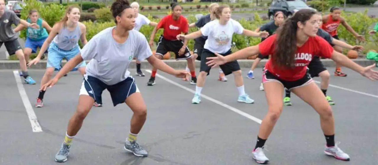 Playing defense in parking lot early morning practice
