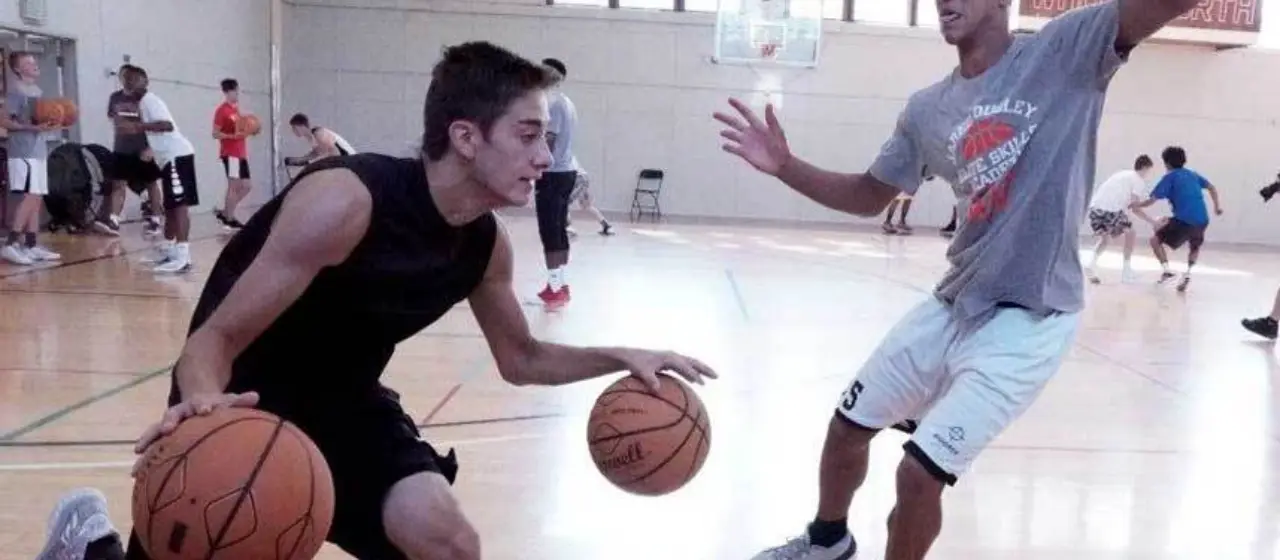Basketball two ball drill teaches focus and skill mastery during basketball camp