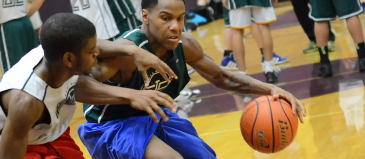 Athletes navigate the physical nature of basketball at college prep camp