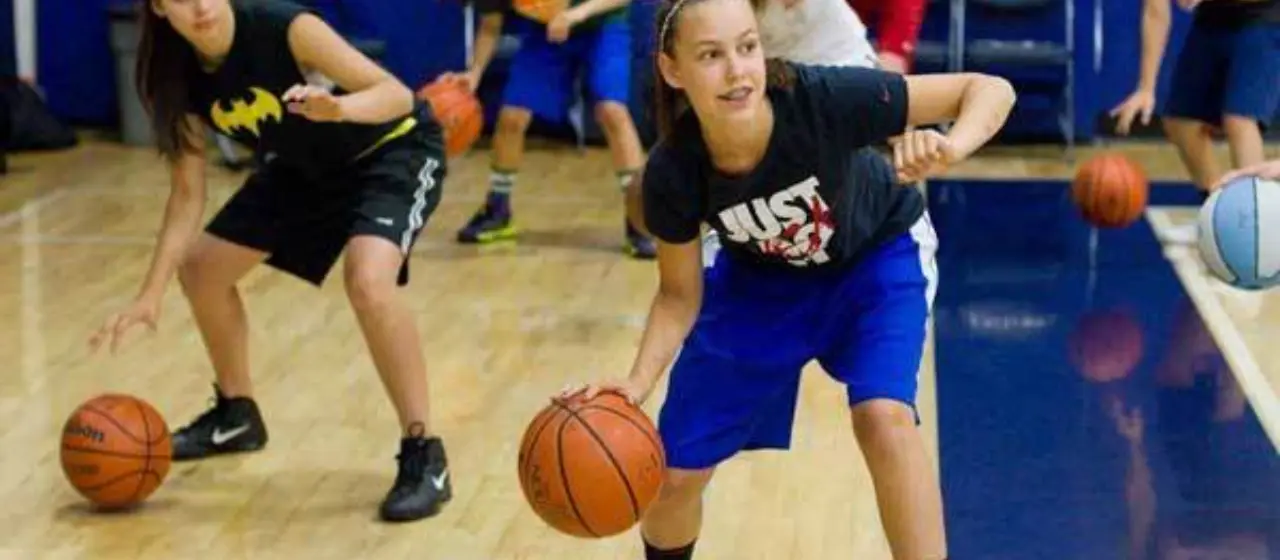 Basketball Players practice their guard arm to protect against the defense..