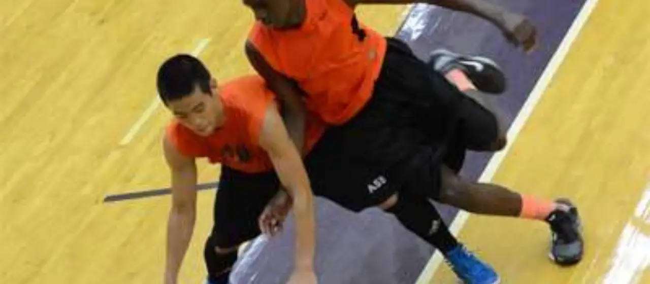 Boys battle for the ball at Basketball All-Star Camp