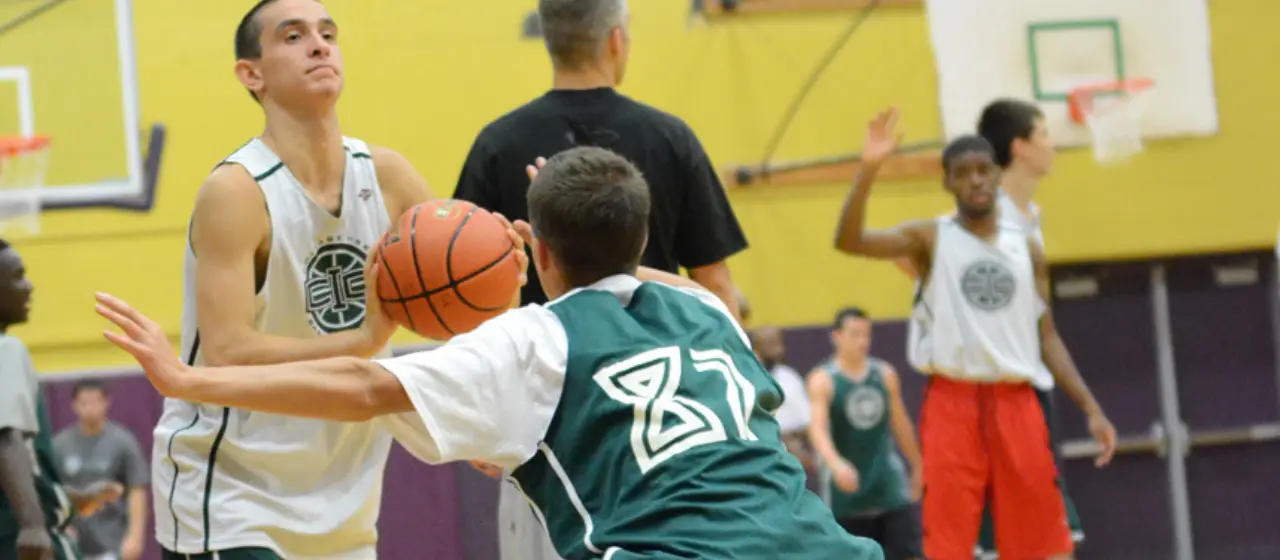 Athletes face off in one on one competitive drill at NBC Basketball Camps