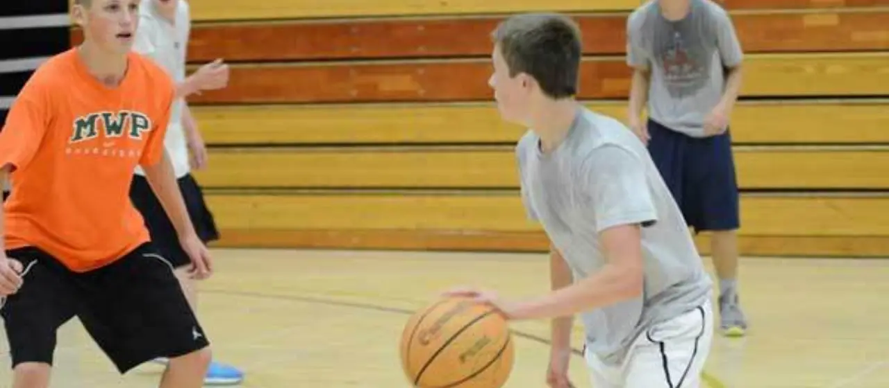 Athlete looks up the court at NBC Basketball Camp