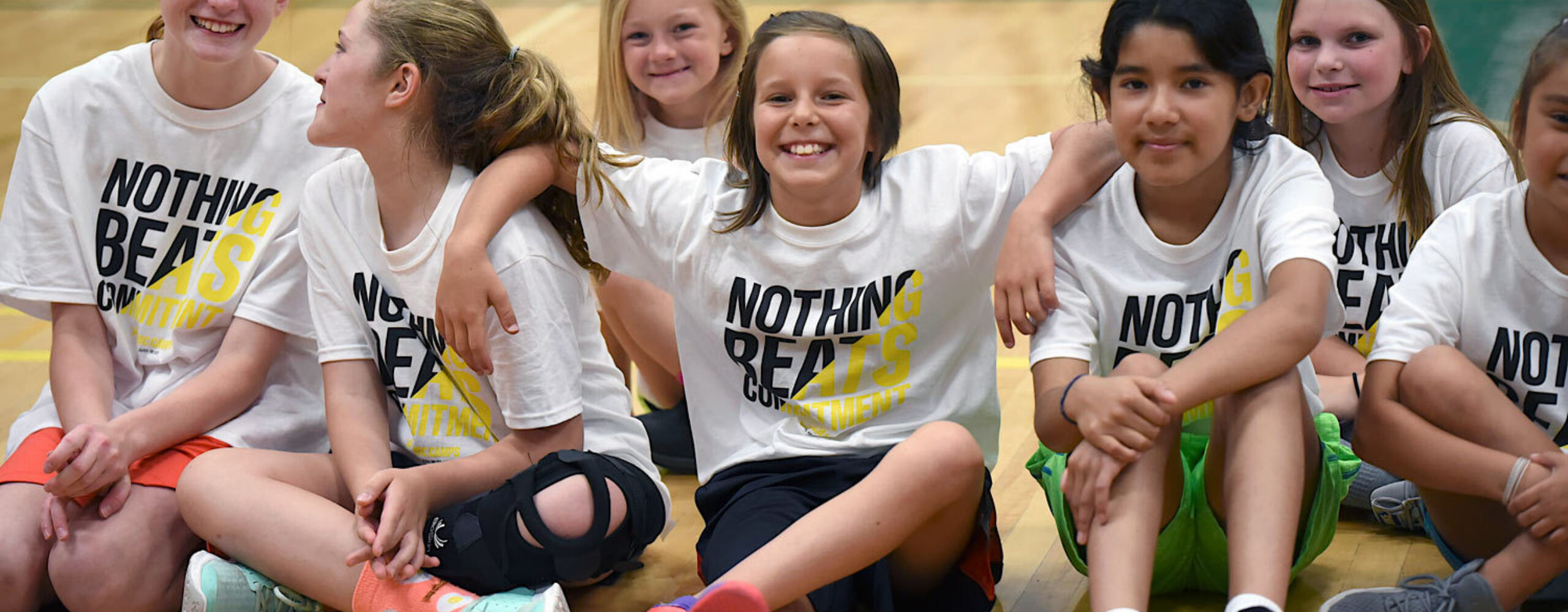 young girls basketball campers having fun together
